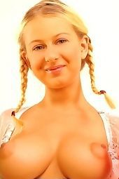 Busty pig tailed blonde